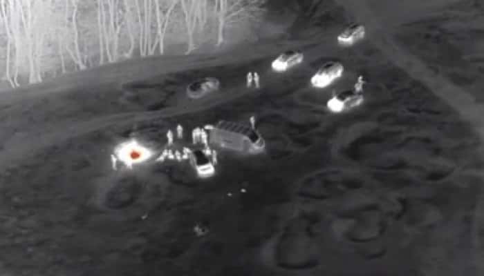 VIDEO - Mai mulți petrecăreți care au încins grătarul în miez de noapte, într-o localitate aflată în carantină, au fost depistați cu ajutorul unei drone